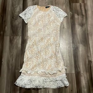 Lace white dress with a tan lining